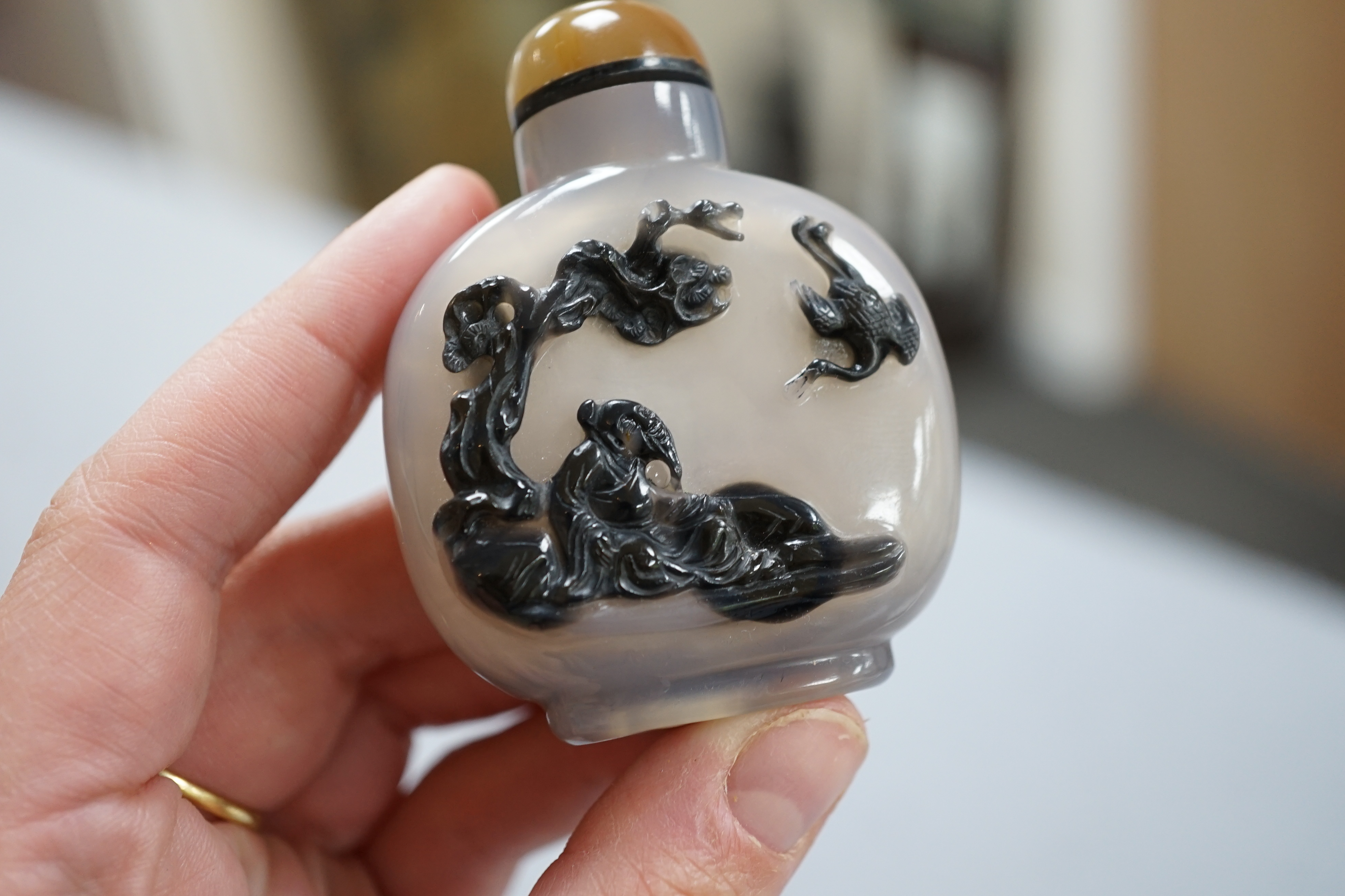 A Chinese cameo agate ‘sage and crane’ snuff bottle, 19th century